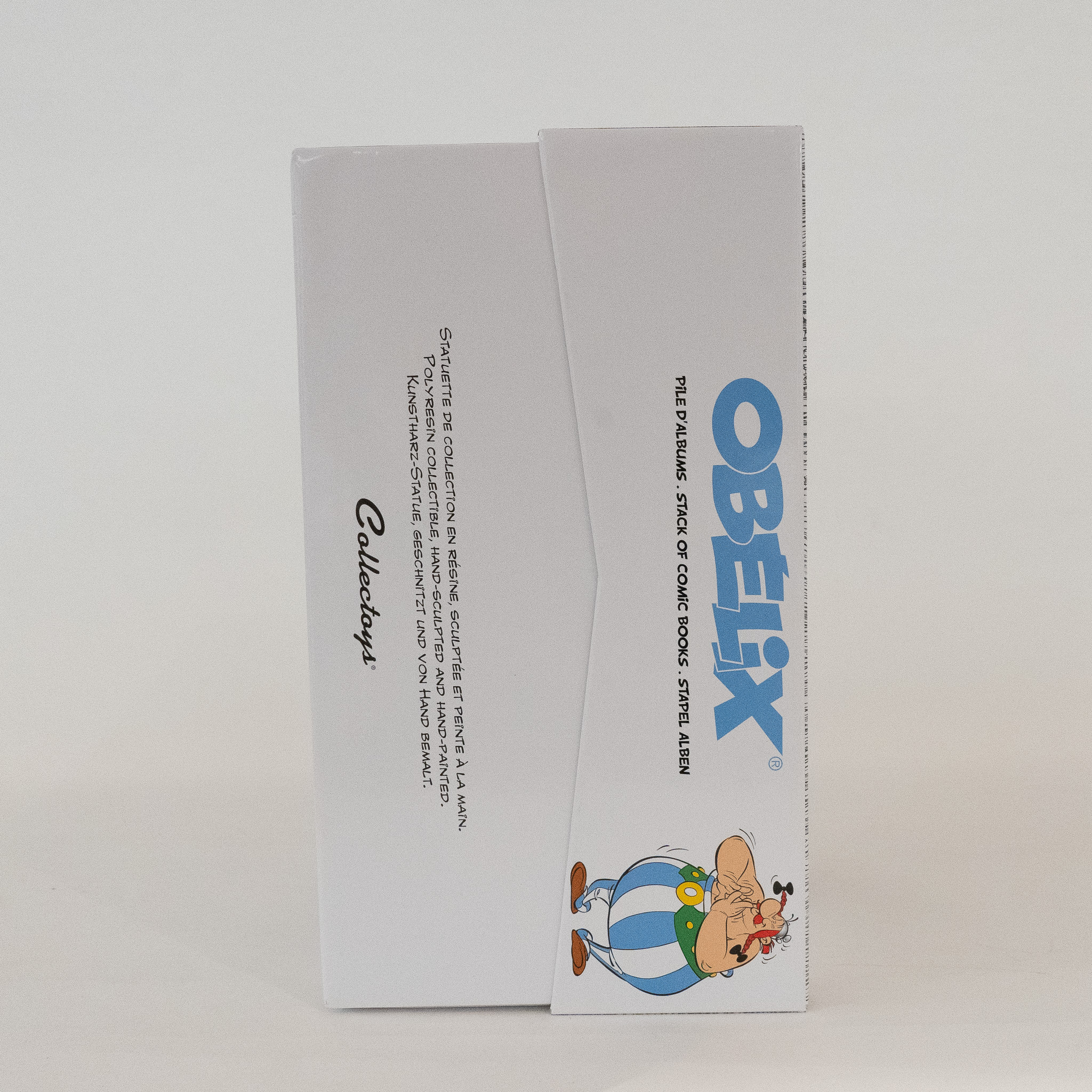 Asterix: Statue Obelix mit Bücherstapel Asterix: Statue Obelix mit Bücherstapel