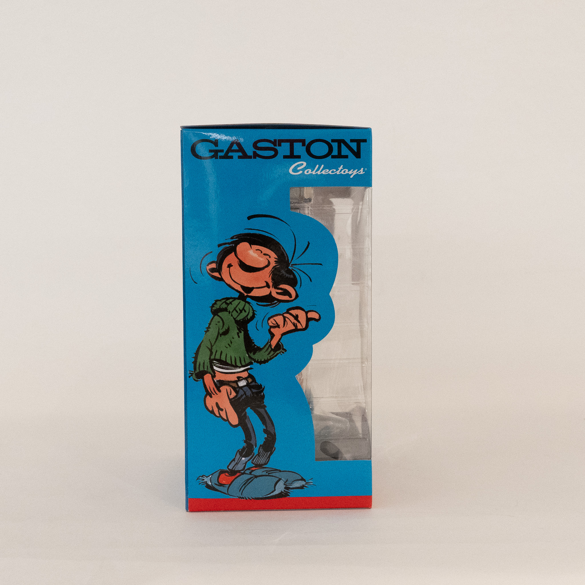 Gaston: Statue Gaston mit Bücherstapel Gaston: Statue Gaston mit Bücherstapel