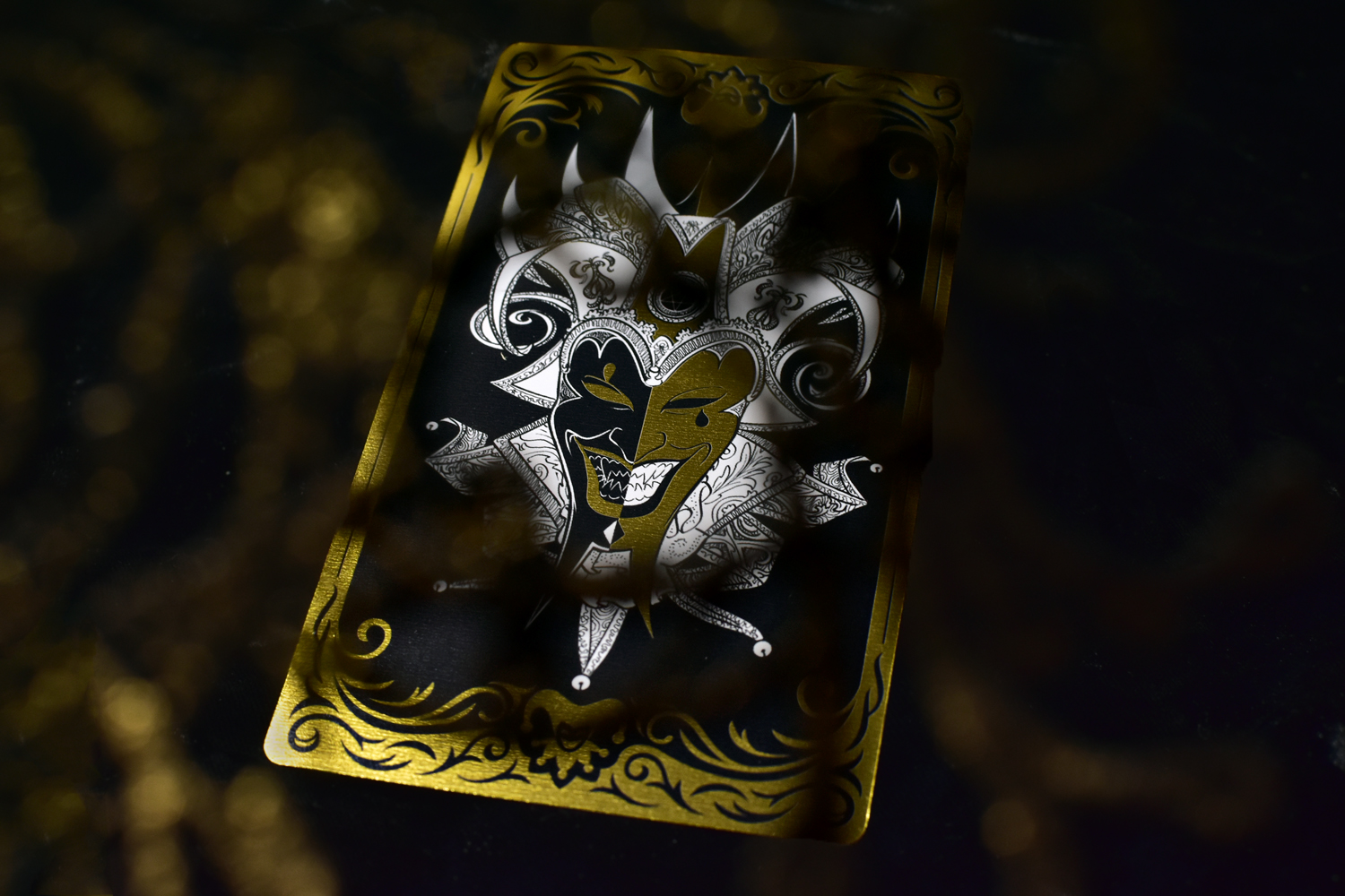 Spielkarte, Joker-Motiv, schwarz-gold, Ornamentmuster