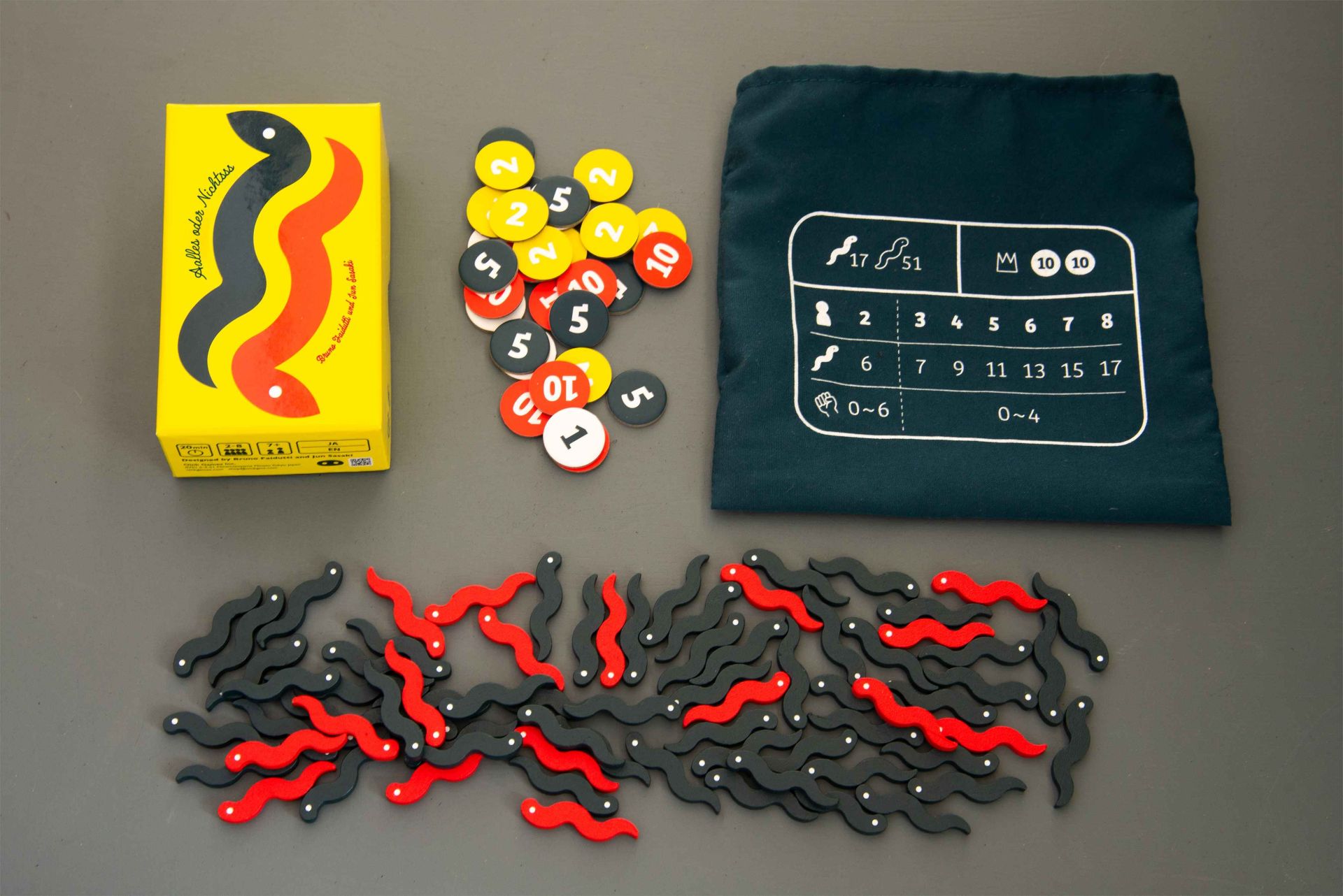 Aalles oder Nichtsss dominoes, puzzle game, board game, tokens, slingers (snakes)